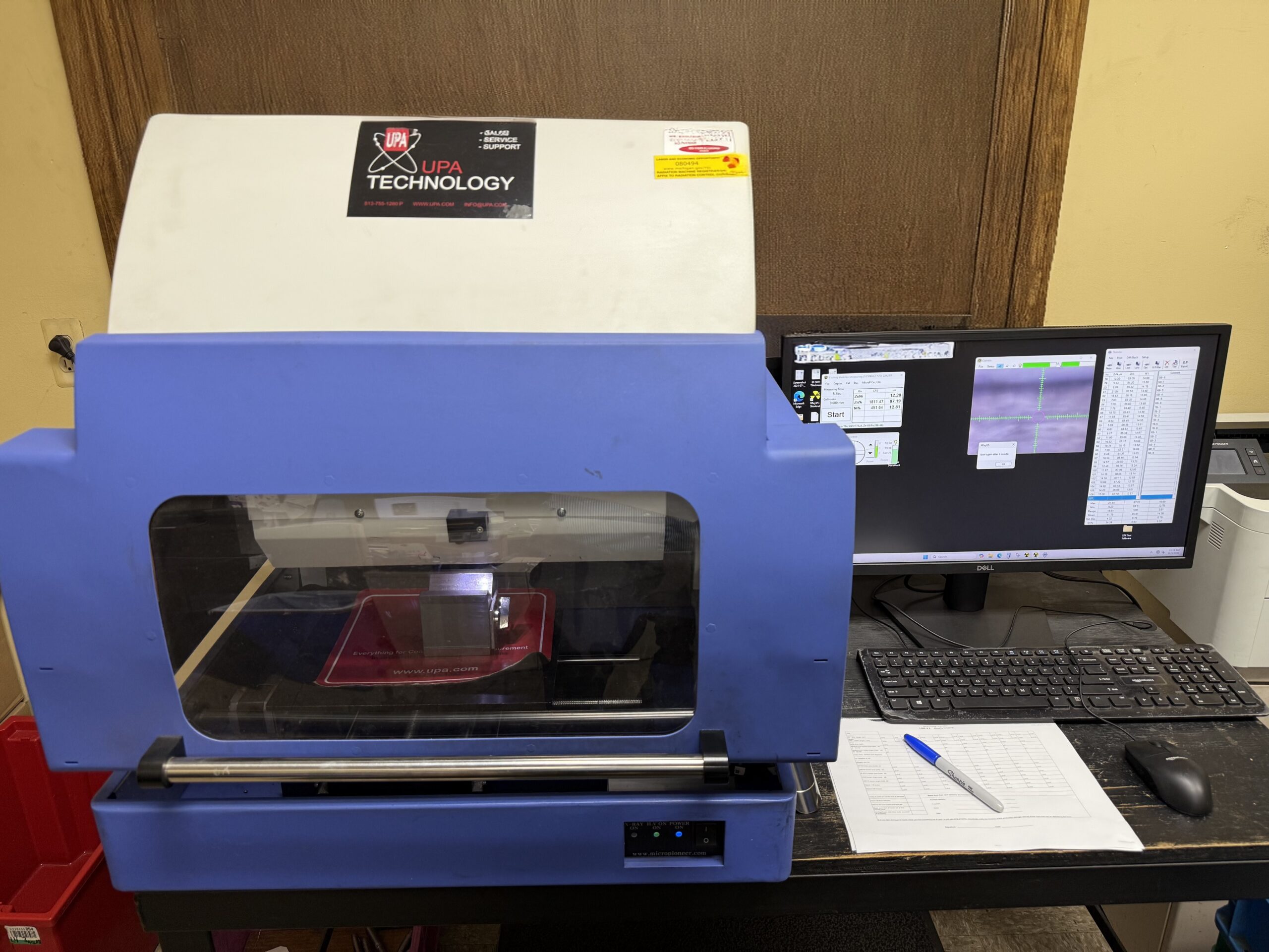 X-ray fluorescence thickness gauge